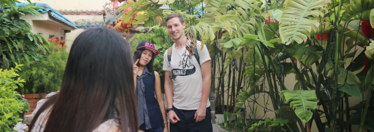 Chinese macht Foto mit Europäer